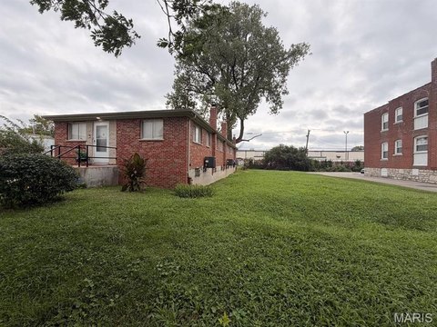 Brick Ranch Triplex with Three Two-Bed Units