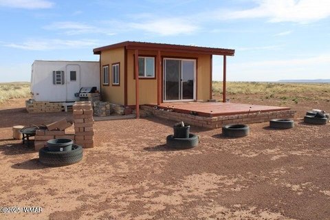 Fenced Land with RV Setup