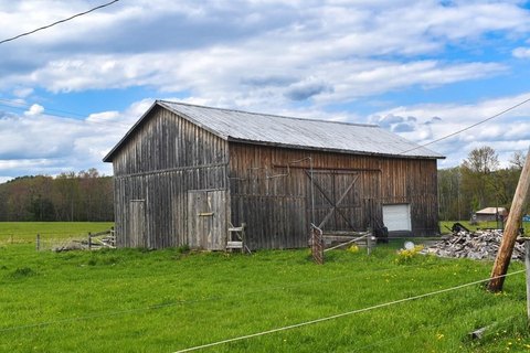 Level Acreage with Barn and Workshop
