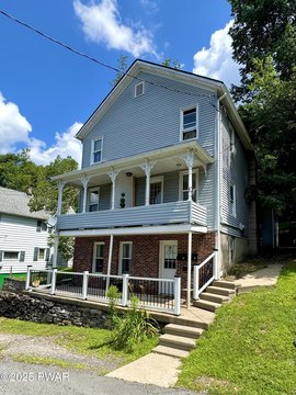 Updated Triplex with Rental Income