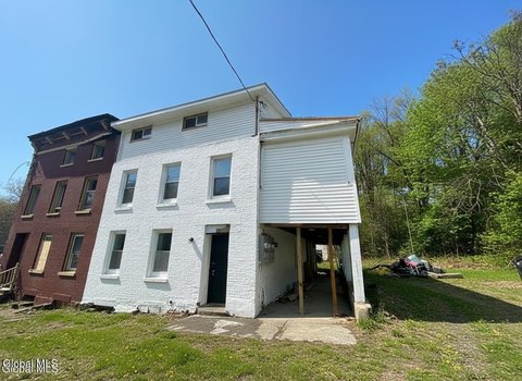 Updated Brick Three-Unit Building