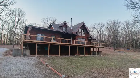 Log Home on 40 Acres