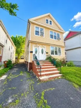 Two-Family Duplex with Detached Garage