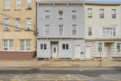 Three-Unit Triplex with Backyard