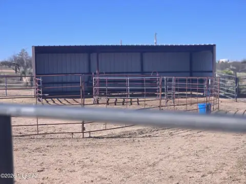 Partially Fenced Land with Building