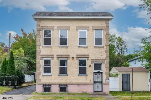 Duplex with Four-Car Garage