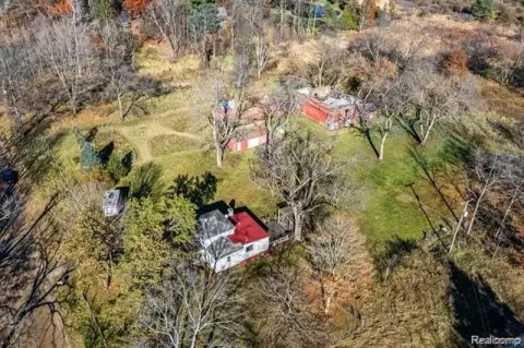 Farmhouse with 19 Acres