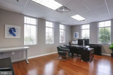 Top-Floor Corner Office Suite