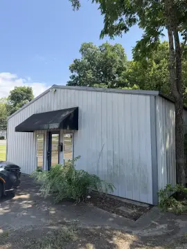 Metal Retail Building with Vacant Lot