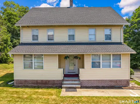Renovated Apartment Building with Mixed-Use Potential