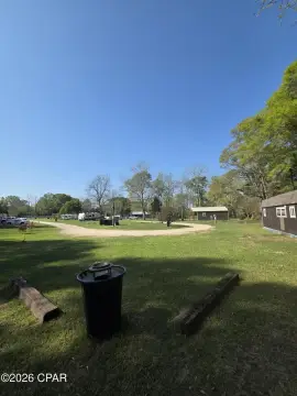 Treed RV Park With Pond