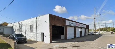 Industrial Warehouse with Fenced Storage