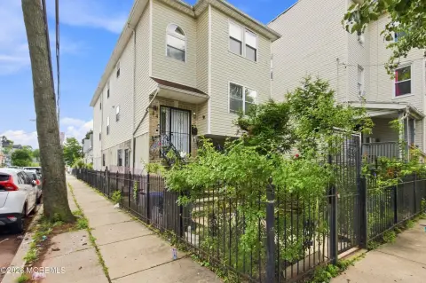 Brick Triplex with Gated Parking