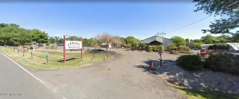 Commercial Land with Existing Improvements
