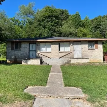 Brick Duplex with Occupied Units
