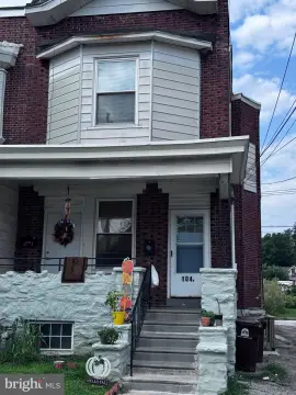 Brick Duplex with Driveway Parking