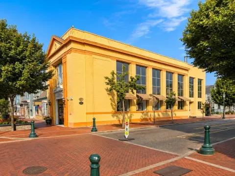 Masonry Storefront With Upper-Floor Volume
