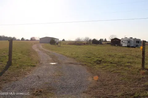 Private Acreage with Improvements