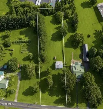 Commercial Land with Existing Improvements