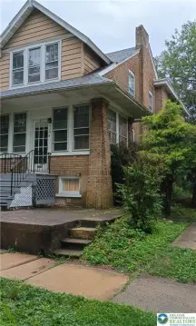 Residential Income Property with Basement Bar