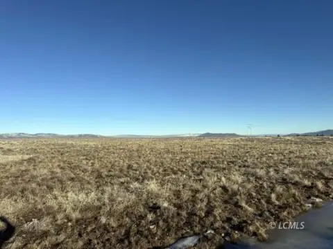 Land with Mountain and Valley Views