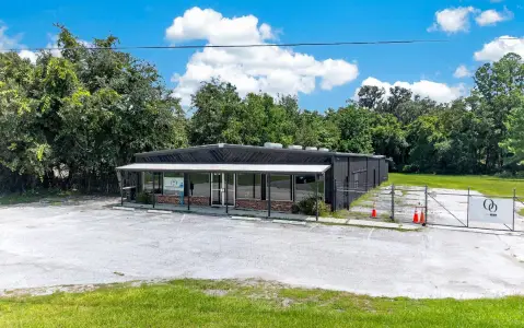 Fenced Single-Story Storefront