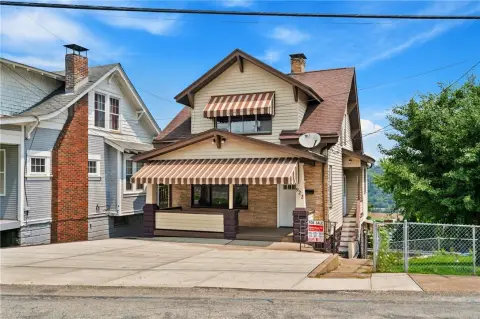 Duplex with Three-Car Garage