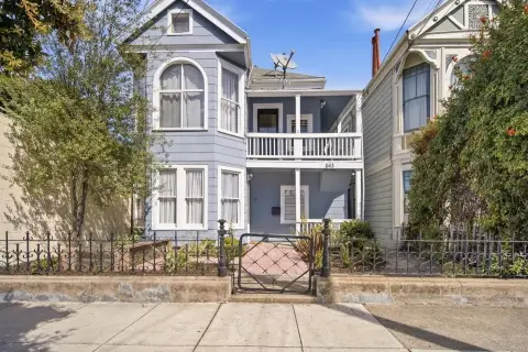 Victorian Duplex with Stained Glass