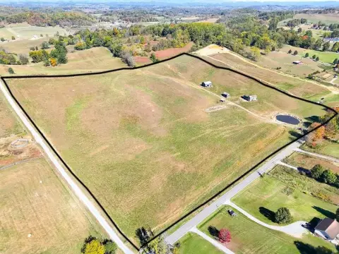 Picturesque Farmland with Mountain Views