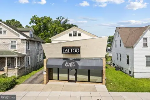Turnkey Tattoo Parlor with Apartment