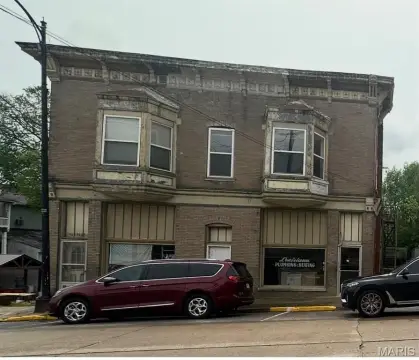 Mixed-Use Building with Apartment