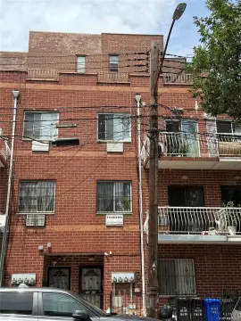 Brick Triplex With Finished Basement