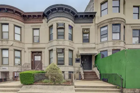 Two-Family Townhouse with Development Potential