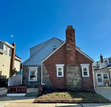 Updated Two-Family Home Near Beach