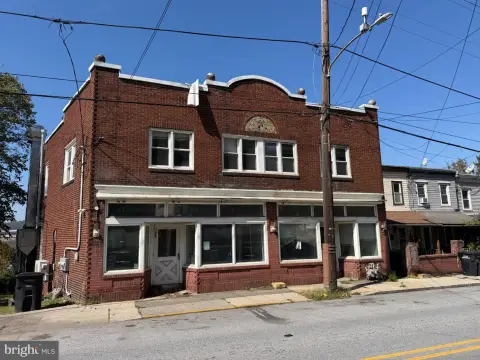 Mixed-Use Building with Two Apartments