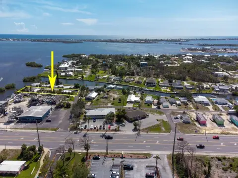 Waterfront Triplex with Redevelopment Potential