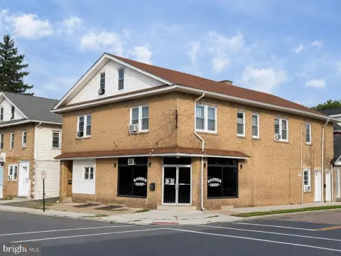 Occupied Four-Unit Mixed-Use Property