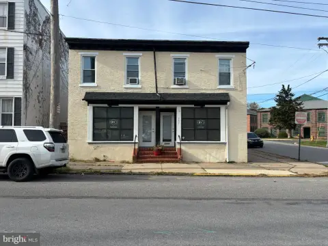Mixed-Use Triplex with Parking