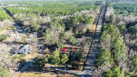 Cleared Acreage with Charming Home