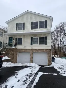 Spacious Two-Family Home with Garage