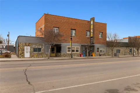 Mixed-Use Property with Bar and Apartments