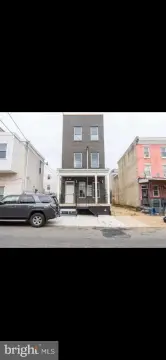 Triplex with Private Rooftop Deck