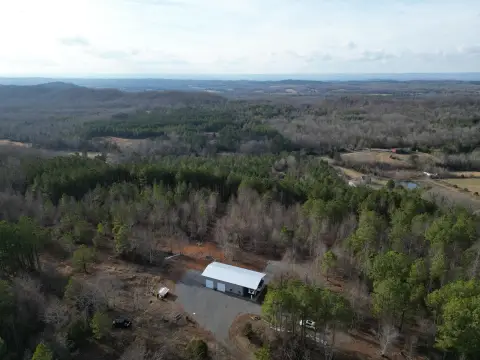 Secluded Mountain Acreage with Improvements