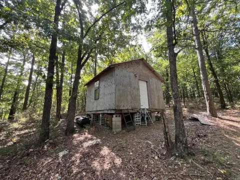Hunting Land with Creek and Cabin