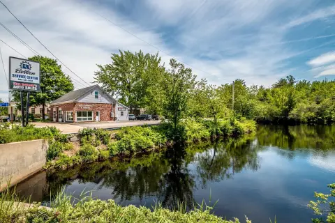 Mixed-Use Building with Pond Frontage