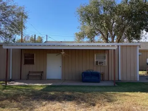 Vacant Lot with Storage Building