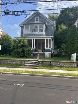 Duplex With Detached Four-Car Garage
