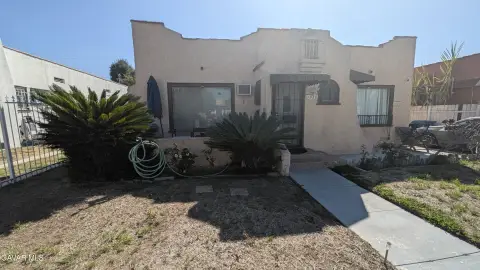 Duplex With Detached Garage