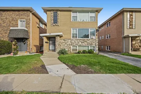 Brick Triplex with Detached Garage