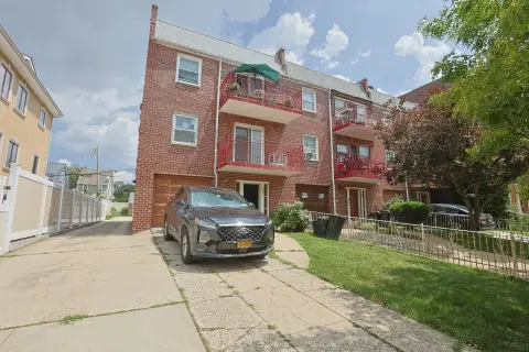 Brick Triplex with Garages